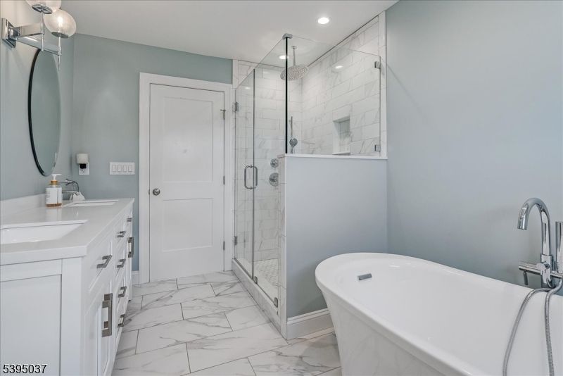 Bathroom, Dual Sink Vanities, Free Standing Baths, Glass Shower, Interior, Marble, Marble Walls, Recessed Lighting