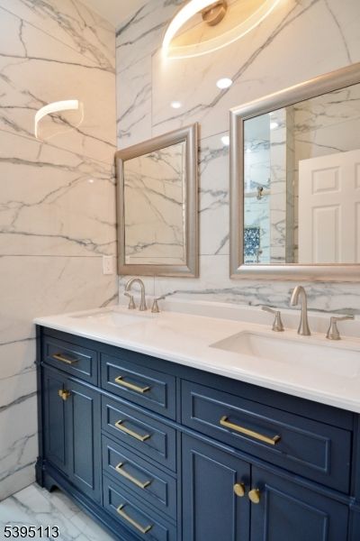Bathroom, Dual Sink Vanities, Interior, Marble, Marble Walls, Recessed Lighting
