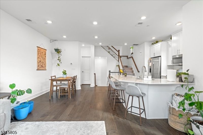 Dining room, Interior, Kitchen, Recessed Lighting, Stainless Steel Appliances, Wood Texture Flooring