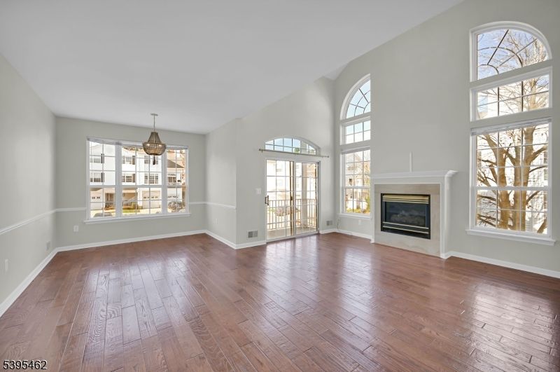 Chandelier, Empty room, Fireplace, Interior, Pendant Lights, Wood Texture Flooring
