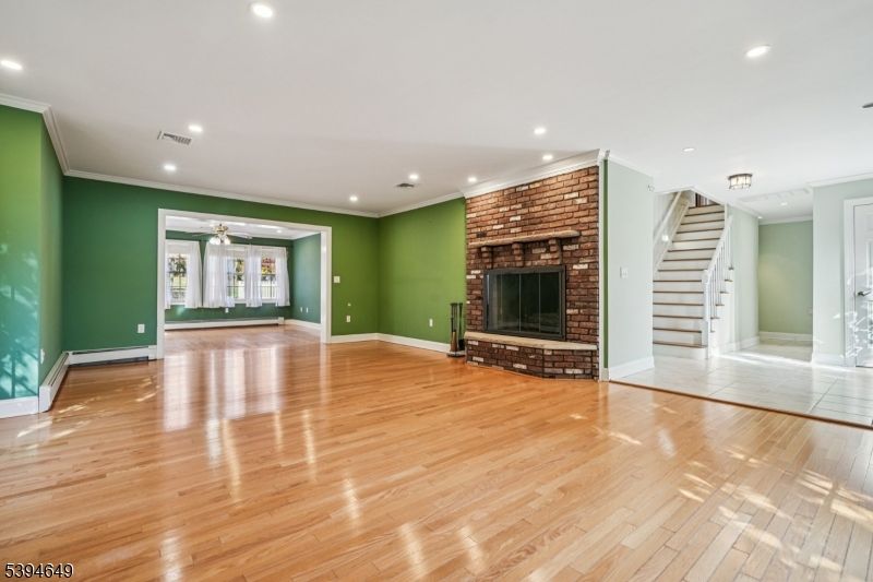 Empty room, Fireplace, Interior, Recessed Lighting, Wood Texture Flooring