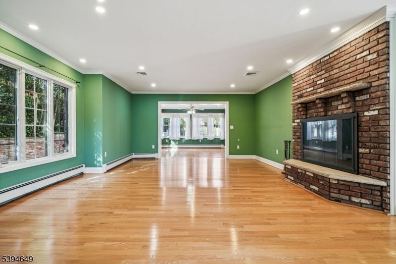 Empty room, Fireplace, Interior, Recessed Lighting, Wood Texture Flooring