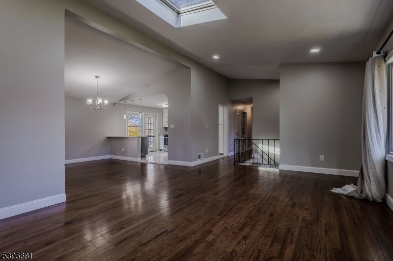 Chandelier, Empty room, Interior, Recessed Lighting, Wood Texture Flooring