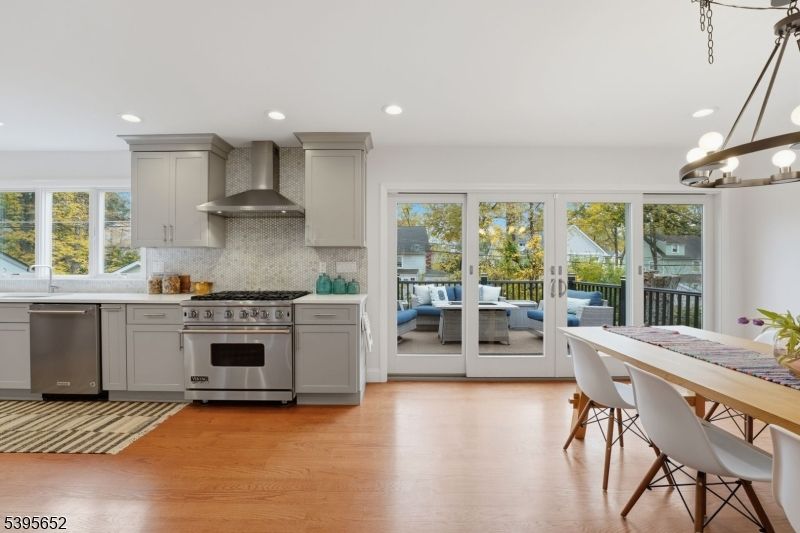 Dining room, Interior, Kitchen, Recessed Lighting, Stainless Steel Appliances, Wood Texture Flooring