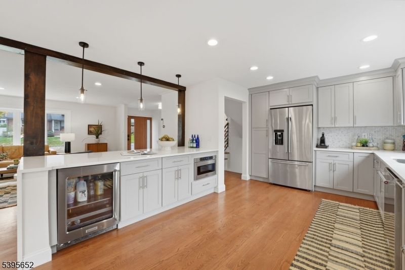 Interior, Kitchen, Pendant Lights, Recessed Lighting, Stainless Steel Appliances, Wood Texture Flooring