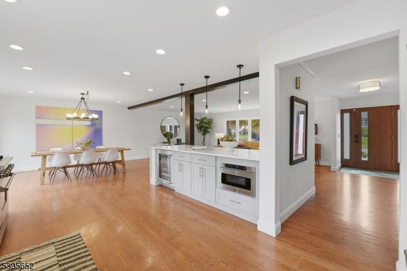 Dining room, Interior, Kitchen, Pendant Lights, Recessed Lighting, Stainless Steel Appliances, Wooden Beams, Wood Texture Flooring