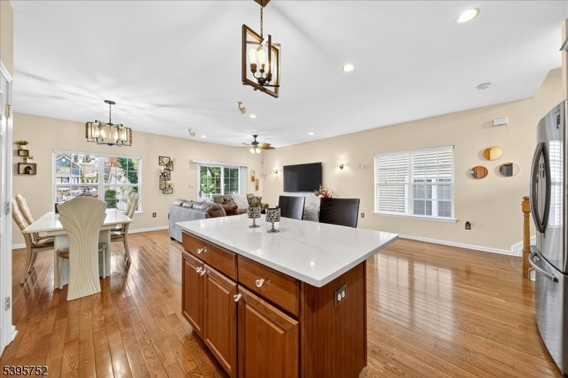 Chandelier, Dining room, Interior, Kitchen, Living room, Pendant Lights, Recessed Lighting, Wood Texture Flooring