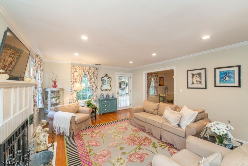 Fireplace, Interior, Living room, Piano, Recessed Lighting, Wood Texture Flooring