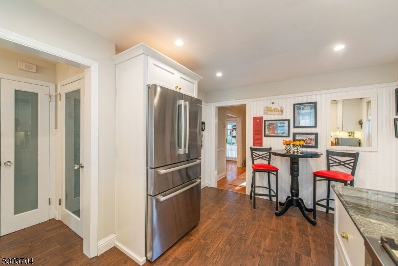 Dining room, Interior, Kitchen, Recessed Lighting, Stainless Steel Appliances, Wood Texture Flooring