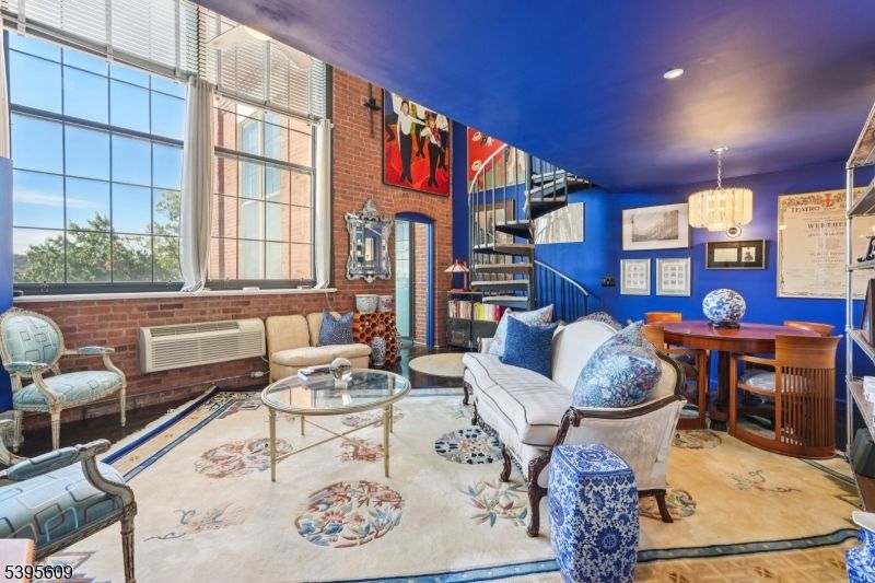 Chandelier, Dining room, Interior, Living room, Recessed Lighting, Stone Walls, Wood Texture Flooring