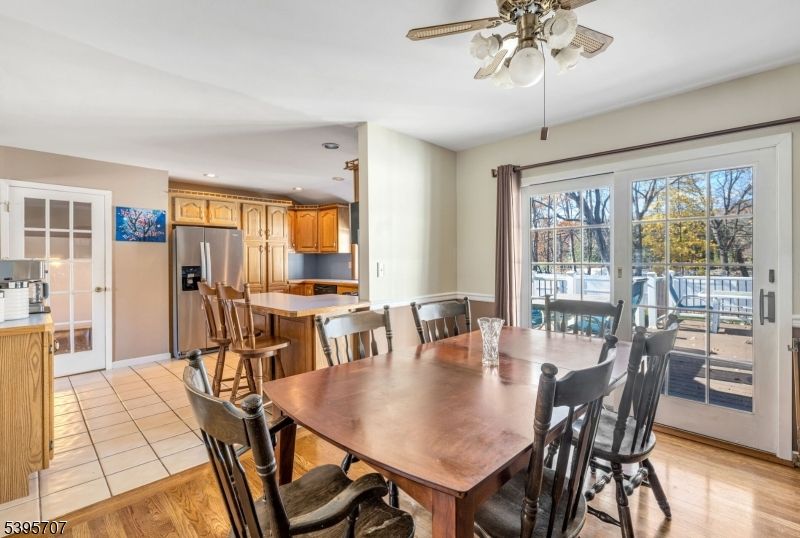 Dining room, Interior, Kitchen, Recessed Lighting, Stainless Steel Appliances, Wood Texture Flooring