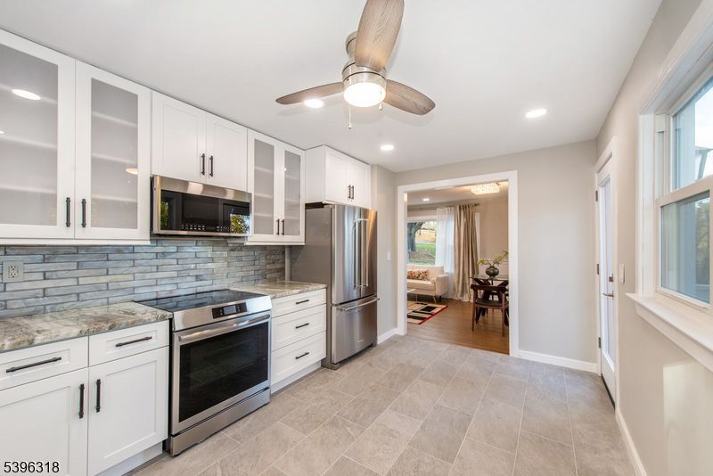 Dining room, Interior, Kitchen, Recessed Lighting, Stainless Steel Appliances, Wood Texture Flooring