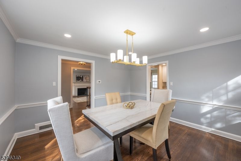 Dining room, Fireplace, Interior, Pendant Lights, Recessed Lighting, Wood Texture Flooring