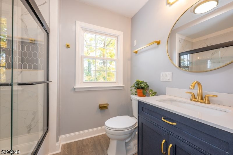 Bathroom, Glass Shower, Interior, Marble Walls, Wood Texture Flooring