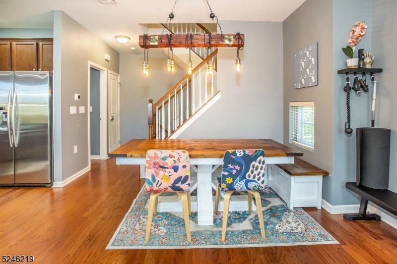 Dining room, Interior, Kitchen, Pendant Lights, Stainless Steel Appliances, Wood Texture Flooring