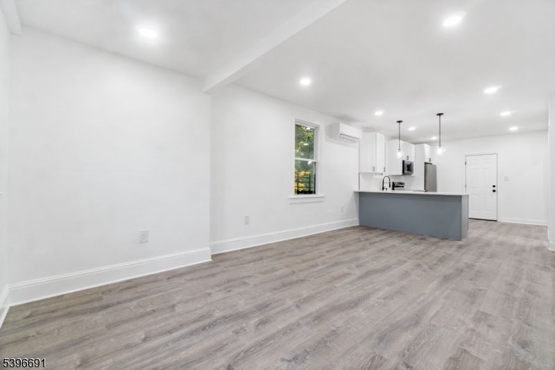 Empty room, Interior, Kitchen, Pendant Lights, Recessed Lighting, Wood Texture Flooring