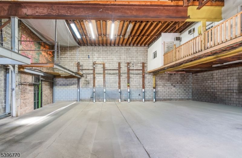 Garage, Interior, Stone Walls, Wooden Beams