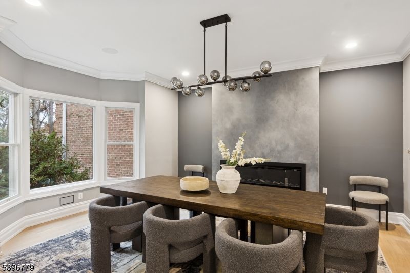 Dining room, Fireplace, Interior, Pendant Lights, Recessed Lighting, Wood Texture Flooring