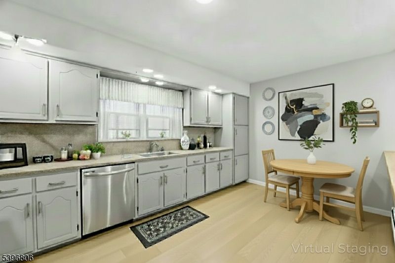 Dining room, Interior, Kitchen, Recessed Lighting, Stainless Steel Appliances, Wood Texture Flooring