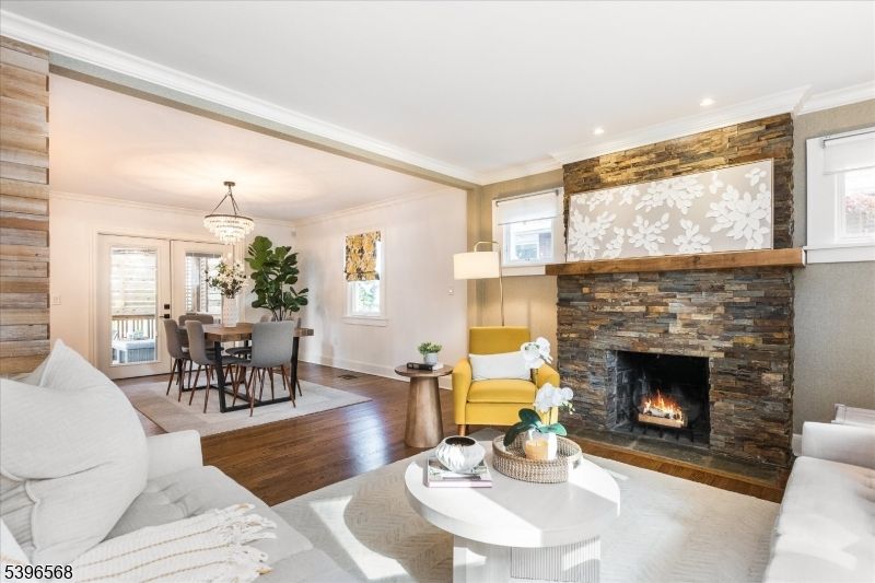 Chandelier, Dining room, Fireplace, Interior, Living room, Recessed Lighting, Wood Texture Flooring