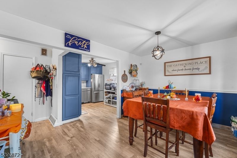 Dining room, Interior, Kitchen, Pendant Lights, Stainless Steel Appliances, Wood Texture Flooring