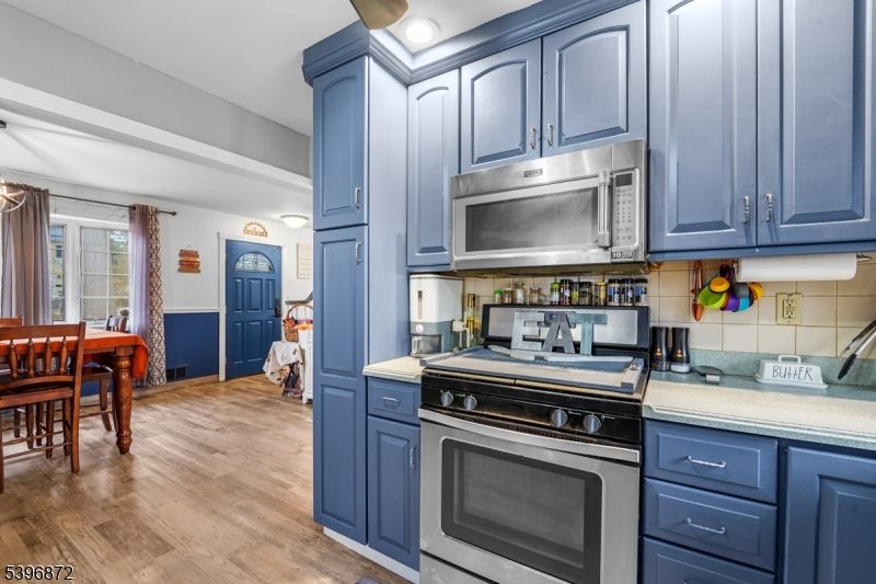 Dining room, Interior, Kitchen, Recessed Lighting, Stainless Steel Appliances, Wood Texture Flooring