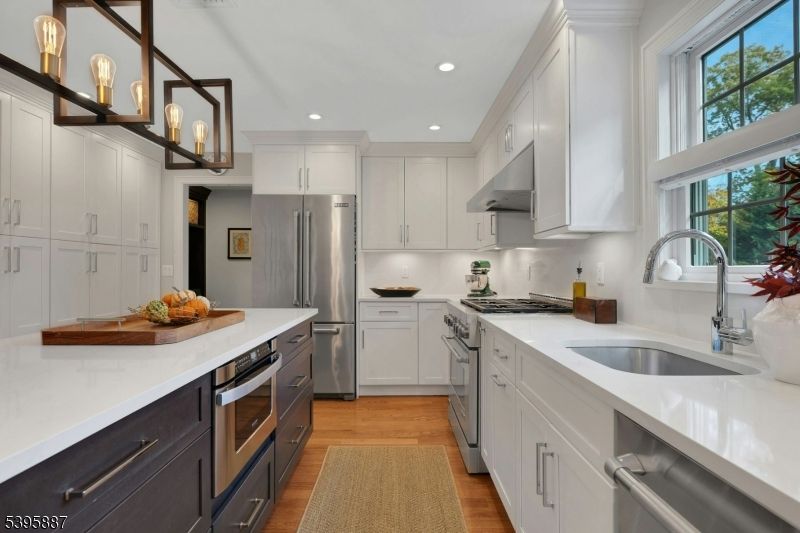 Interior, Kitchen, Pendant Lights, Recessed Lighting, Stainless Steel Appliances, Wood Texture Flooring