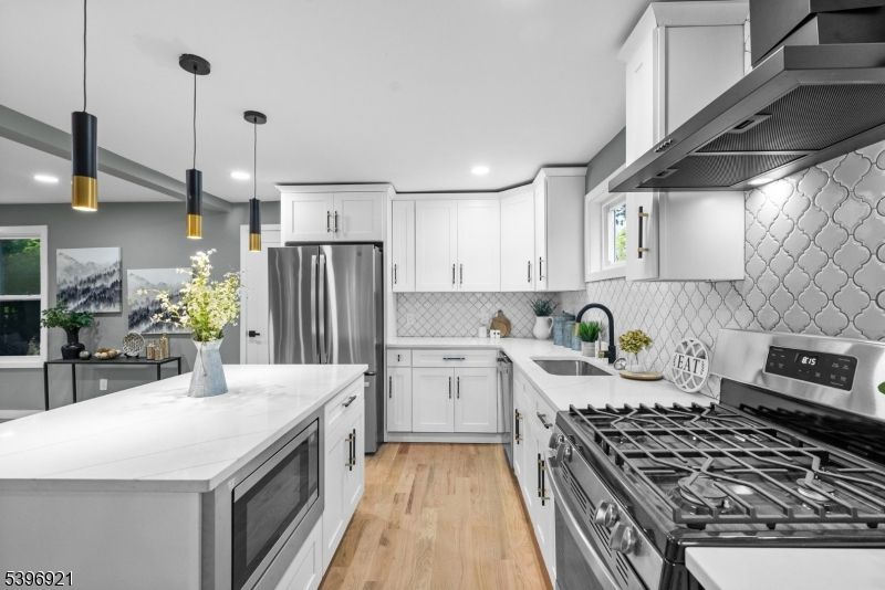 Interior, Kitchen, Pendant Lights, Recessed Lighting, Stainless Steel Appliances, Wood Texture Flooring