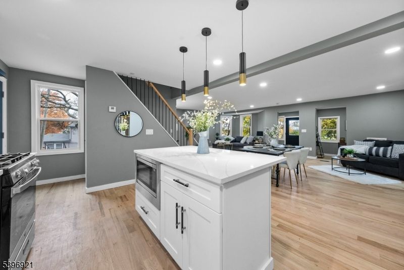 Dining room, Interior, Kitchen, Living room, Pendant Lights, Recessed Lighting, Stainless Steel Appliances, Wood Texture Flooring