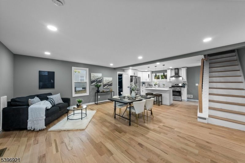 Dining room, Interior, Kitchen, Living room, Pendant Lights, Recessed Lighting, Stainless Steel Appliances, Wood Texture Flooring