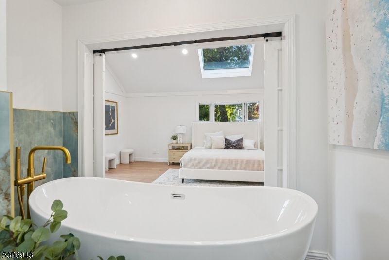 Bathroom, Bedroom, Free Standing Baths, Interior, Recessed Lighting, Wood Texture Flooring