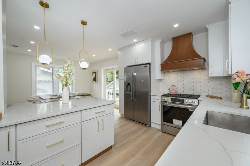Interior, Kitchen, Pendant Lights, Recessed Lighting, Stainless Steel Appliances, Wood Texture Flooring
