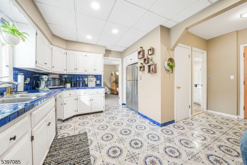 Interior, Kitchen, Recessed Lighting, Tile Countertops