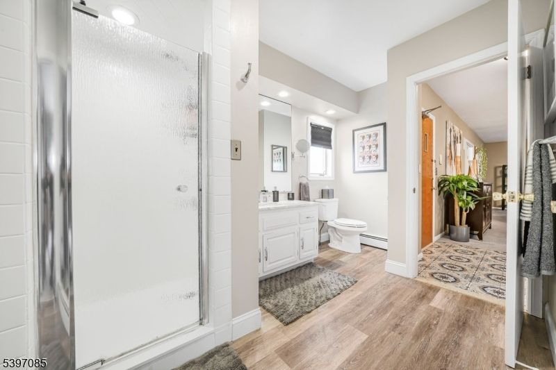 Bathroom, Glass Shower, Interior, Recessed Lighting, Wood Texture Flooring