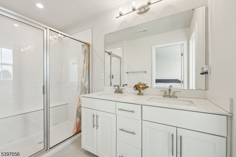 Bathroom, Dual Sink Vanities, Glass Shower, Interior, Recessed Lighting