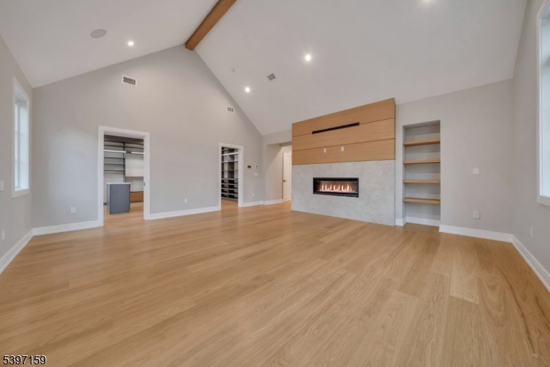 Empty room, Fireplace, Interior, Recessed Lighting, Wooden Beams, Wood Texture Flooring