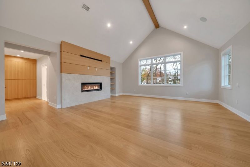 Empty room, Fireplace, Interior, Recessed Lighting, Wooden Beams, Wood Texture Flooring