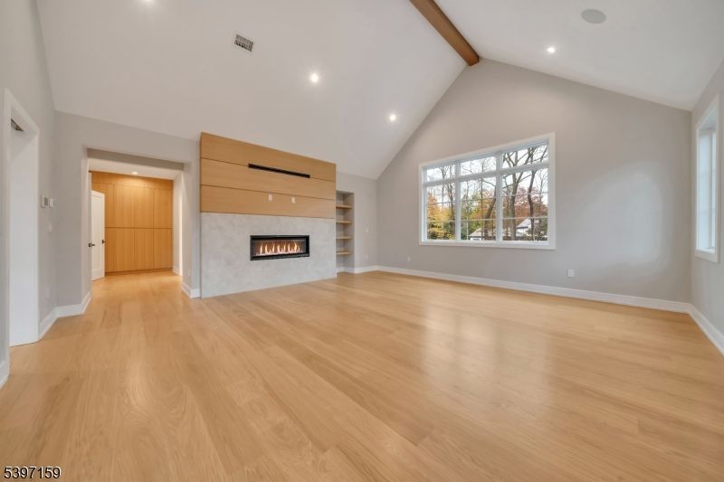 Empty room, Fireplace, Interior, Recessed Lighting, Wooden Beams, Wood Texture Flooring