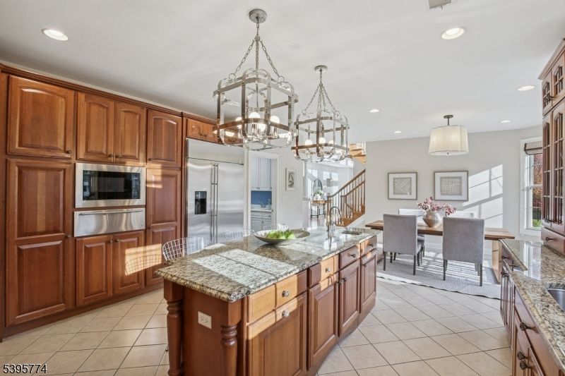 Chandelier, Dining room, Interior, Kitchen, Pendant Lights, Recessed Lighting, Stainless Steel Appliances
