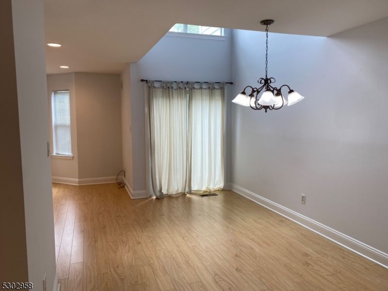 Chandelier, Empty room, Interior, Recessed Lighting, Wood Texture Flooring