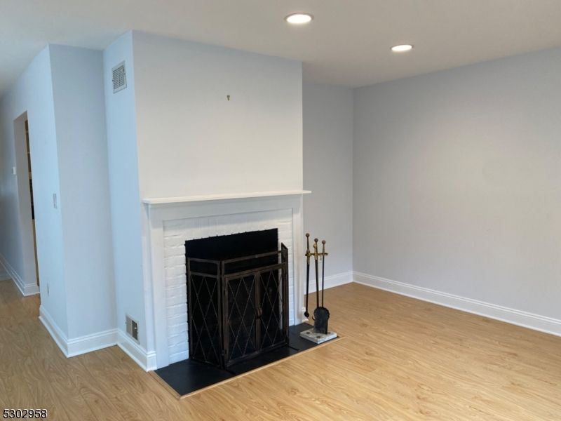 Fireplace, Interior, Recessed Lighting, Wood Texture Flooring