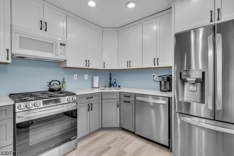 Interior, Kitchen, Recessed Lighting, Stainless Steel Appliances, Wood Texture Flooring