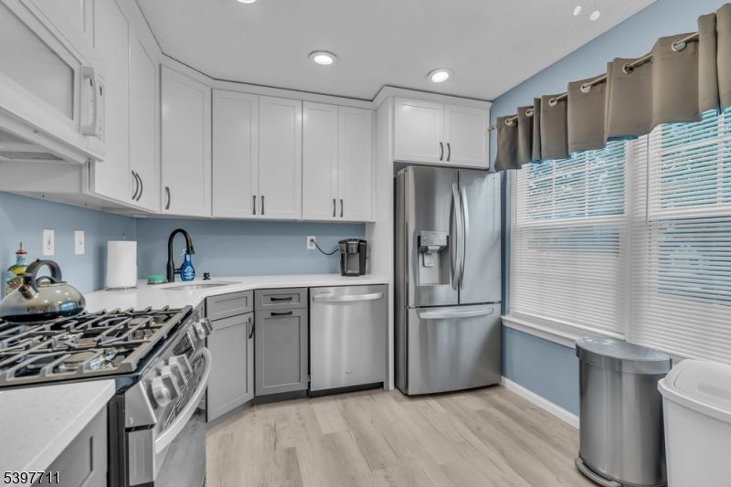 Interior, Kitchen, Recessed Lighting, Stainless Steel Appliances, Wood Texture Flooring