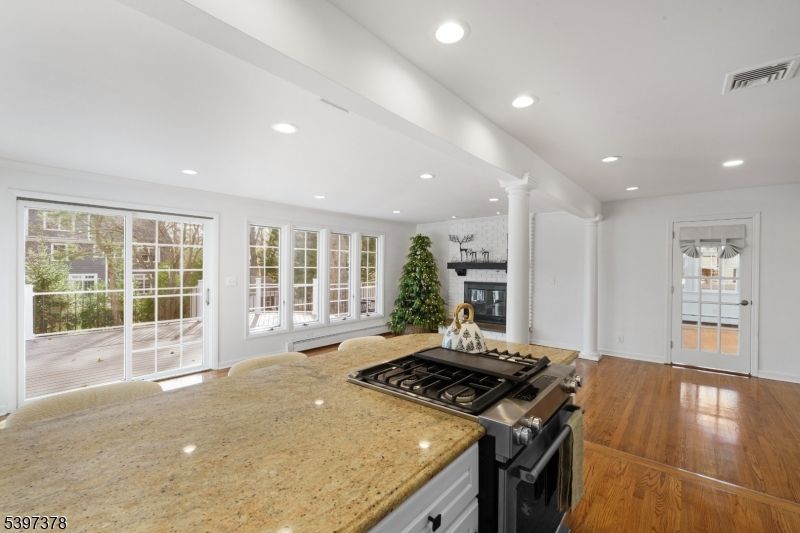 Fireplace, Interior, Kitchen, Recessed Lighting, Wood Texture Flooring