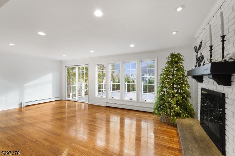 Empty room, Fireplace, Interior, Recessed Lighting, Wood Texture Flooring