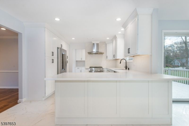 Interior, Kitchen, Marble, Recessed Lighting, Stainless Steel Appliances, Wood Texture Flooring