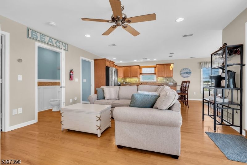 Dining room, Interior, Kitchen, Living room, Recessed Lighting, Stainless Steel Appliances, Wood Texture Flooring
