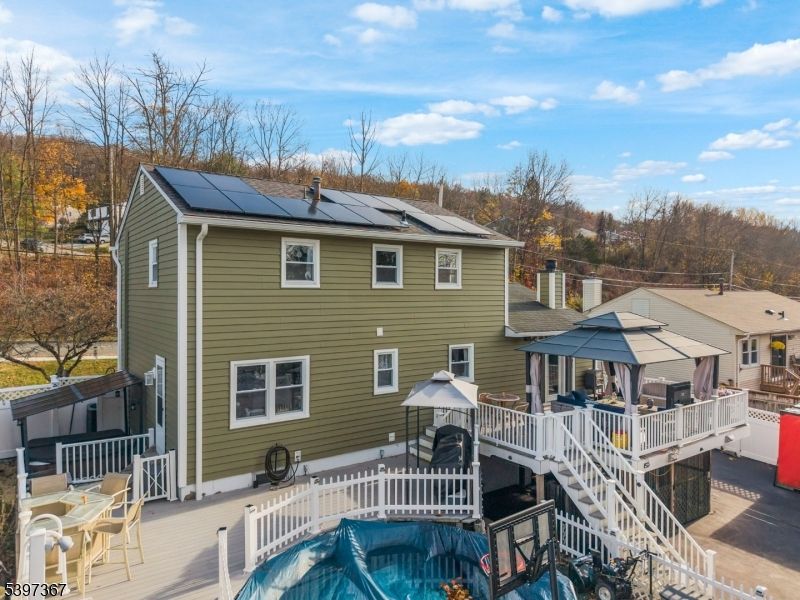 Exterior, Pool, Solar Panels