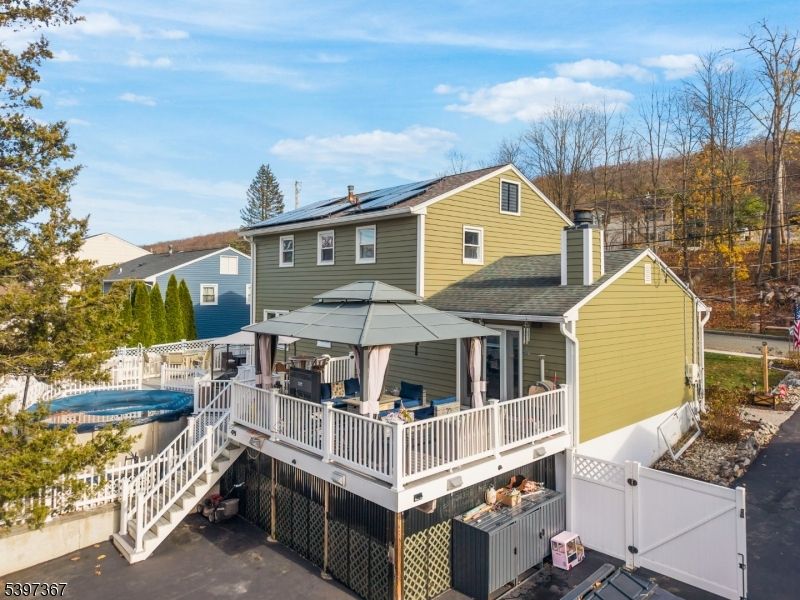 Exterior, Pool, Solar Panels