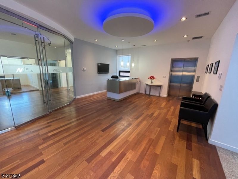 Elevator, Interior, Pendant Lights, Recessed Lighting, Wood Texture Flooring
